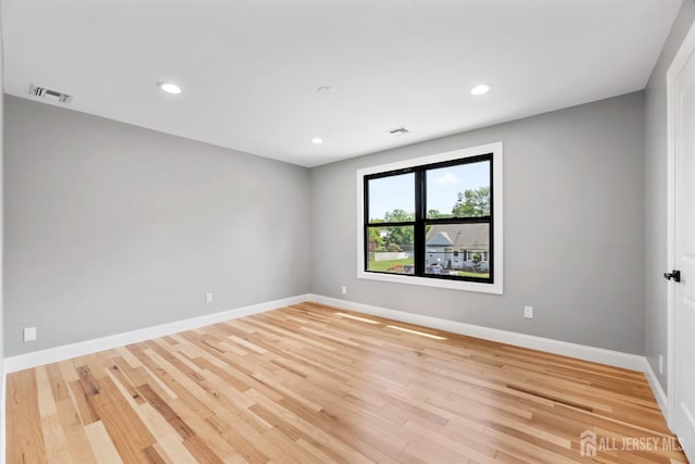 13 Lauretta Dr, East Brunswick, NJ 08816 - unfurnished room with light wood-style flooring and recessed lighting