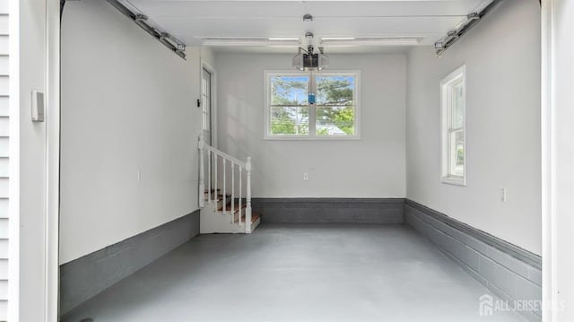 244 Lloyd Rd, Matawan, NJ 07747 - garage featuring a garage door opener