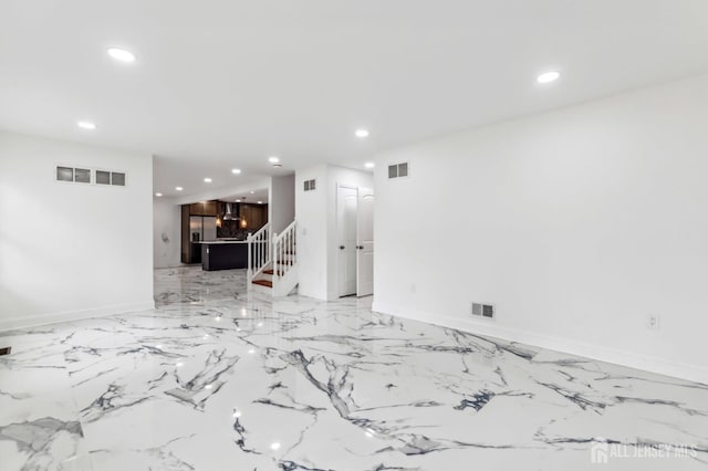 244 Lloyd Rd, Matawan, NJ 07747 - unfurnished living room with recessed lighting, stairway, baseboards, and light marble finish flooring