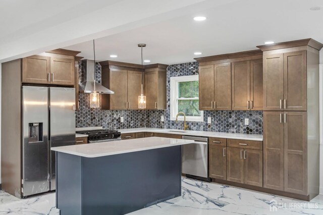244 Lloyd Rd, Matawan, NJ 07747 - kitchen featuring appliances with stainless steel finishes, wall chimney range hood, light marble finish flooring, a sink, and recessed lighting