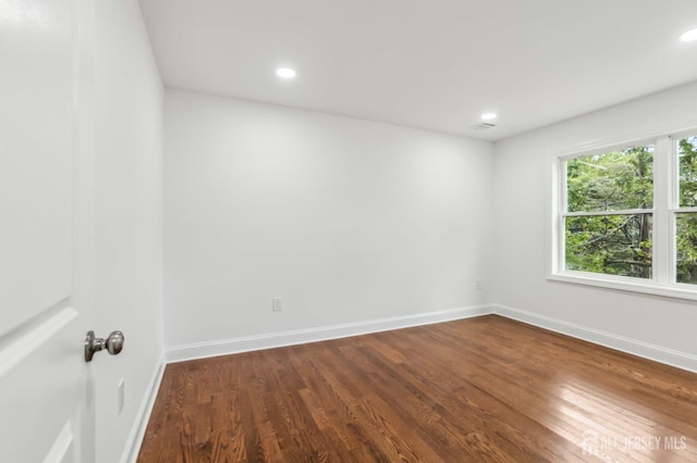 244 Lloyd Rd, Matawan, NJ 07747 - spare room featuring baseboards, dark wood-type flooring, and recessed lighting