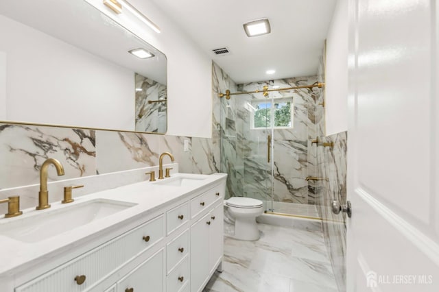 244 Lloyd Rd, Matawan, NJ 07747 - bathroom with tile walls, a marble finish shower, toilet, double vanity, and marble finish floors