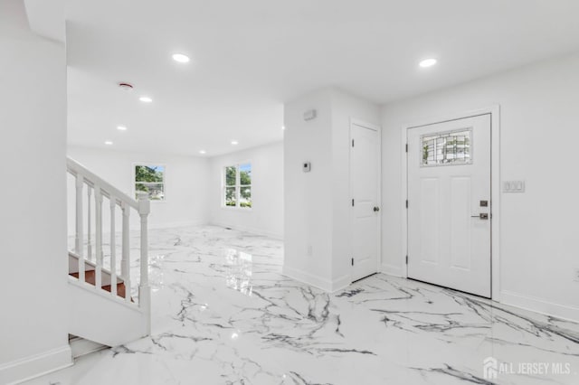 244 Lloyd Rd, Matawan, NJ 07747 - entrance foyer with stairs, recessed lighting, baseboards, and marble finish flooring