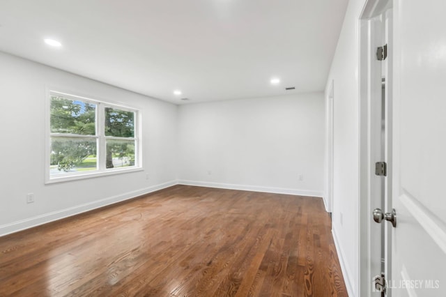244 Lloyd Rd, Matawan, NJ 07747 - unfurnished room featuring dark wood-style flooring, recessed lighting, and baseboards