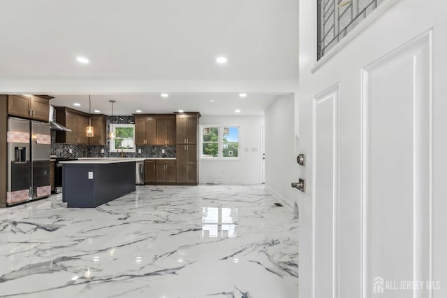 244 Lloyd Rd, Matawan, NJ 07747 - kitchen featuring stainless steel fridge, backsplash, baseboards, recessed lighting, and light marble finish floors