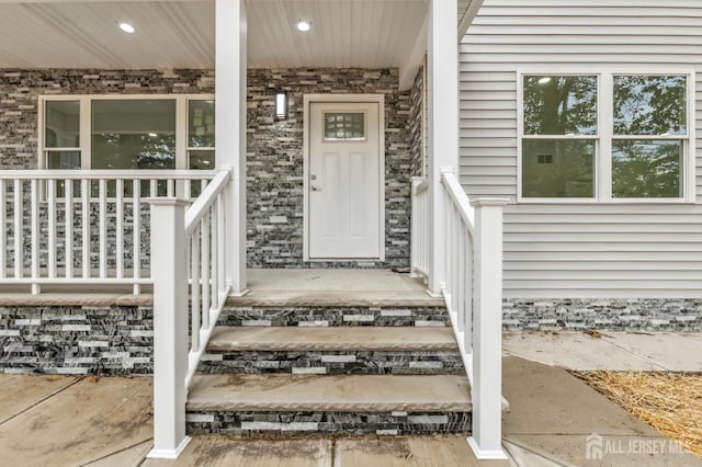 244 Lloyd Rd, Matawan, NJ 07747 - property entrance featuring a porch