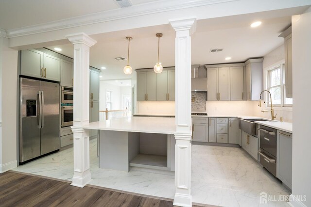 kitchen with decorative columns, gray cabinets, marble finish floor, visible vents, and appliances with stainless steel finishes