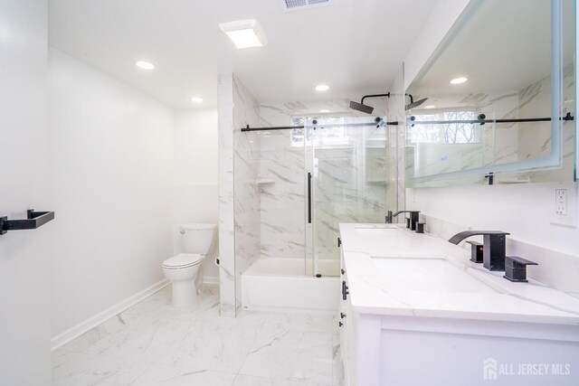 bathroom with toilet, recessed lighting, marble finish floor, baseboards, and double vanity
