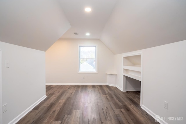 201 Morrison Ave, Hightstown, NJ 08520 - additional living space with built in shelves, lofted ceiling, dark wood finished floors, and recessed lighting