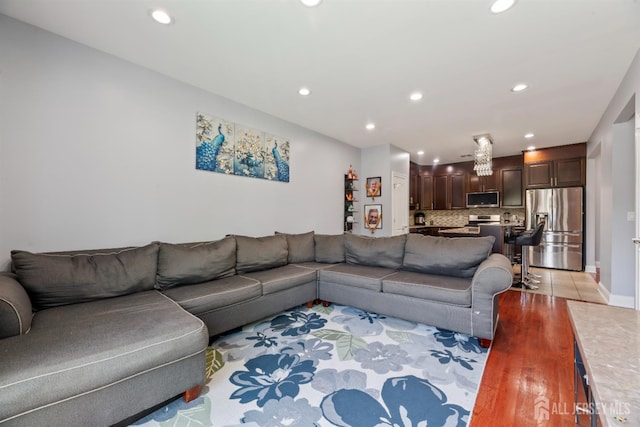 32 Cinder Rd Unit 22, Edison, NJ 08820 - living room with recessed lighting and light wood-style floors