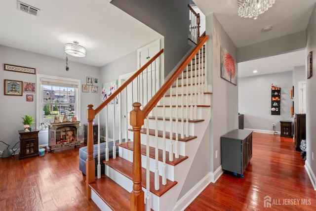 32 Cinder Rd Unit 22, Edison, NJ 08820 - stairs with wood finished floors and a chandelier