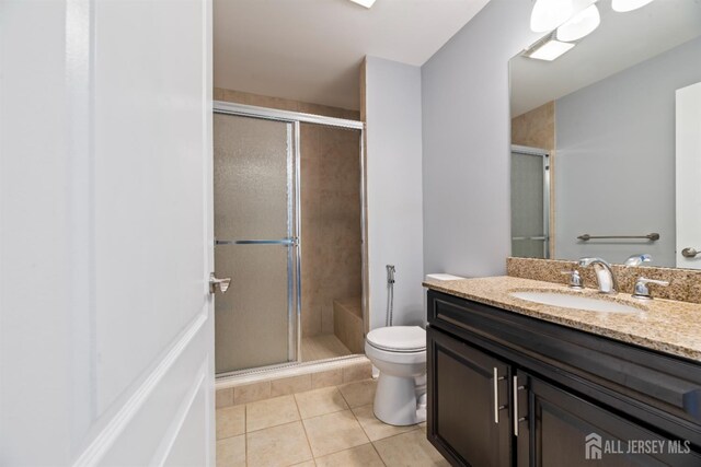 32 Cinder Rd Unit 22, Edison, NJ 08820 - full bath with vanity, a stall shower, and tile patterned flooring