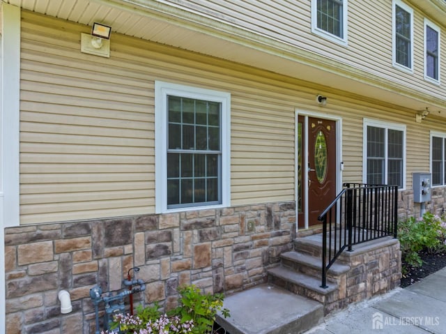 32 Cinder Rd Unit 22, Edison, NJ 08820 - doorway to property featuring stone siding