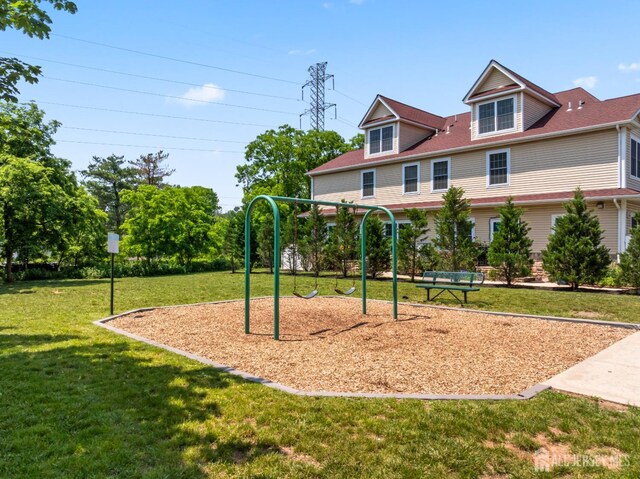 32 Cinder Rd Unit 22, Edison, NJ 08820 - view of jungle gym featuring a lawn