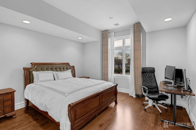 bedroom featuring recessed lighting, baseboards, visible vents, and wood finished floors
