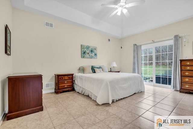 bedroom featuring visible vents, access to exterior, and light tile patterned flooring