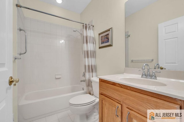 bathroom featuring toilet, shower / bathtub combination with curtain, vanity, and tile patterned flooring