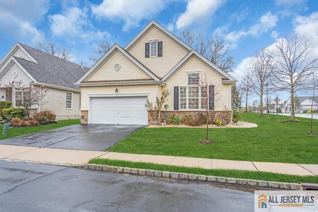 2 Jays Cor, Franklin, NJ 08873 - traditional home with driveway, a front lawn, stone siding, and an attached garage