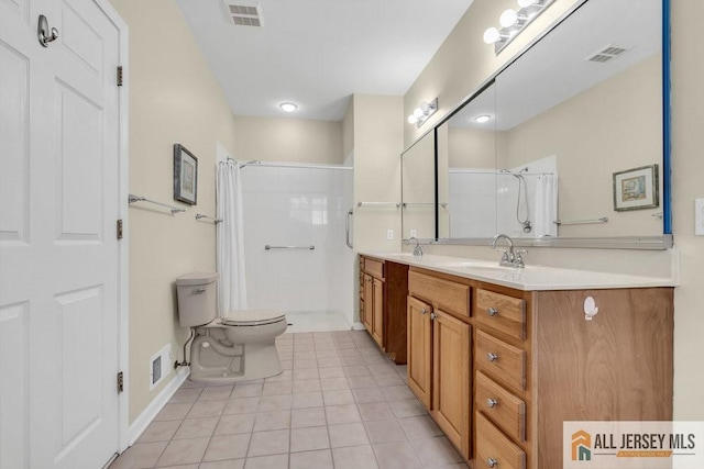 bathroom with visible vents, a sink, and curtained shower