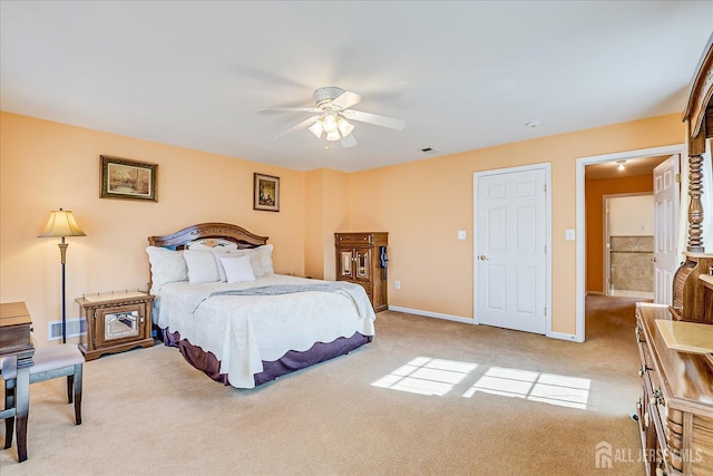 bedroom featuring visible vents, baseboards, carpet floors, and ceiling fan