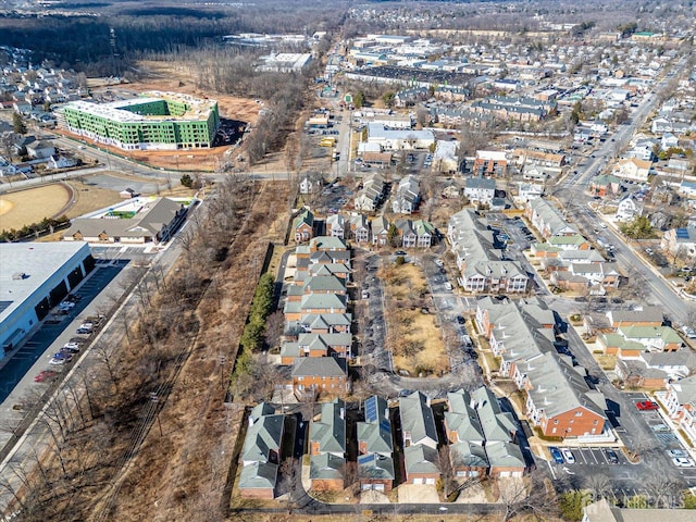 birds eye view of property with a residential view