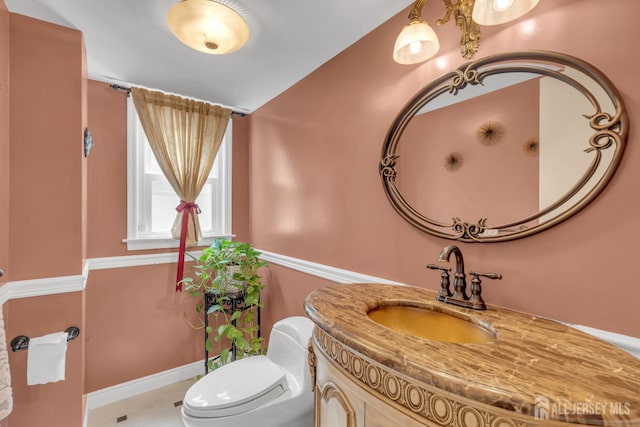 42 Ridge Rd, Edison, NJ 08817 - bathroom with vanity, toilet, and baseboards