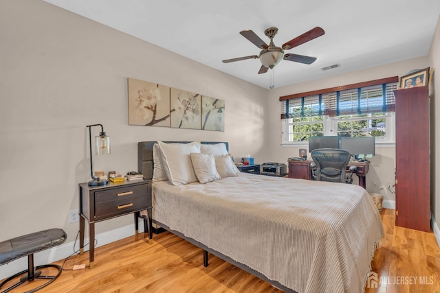 42 Ridge Rd, Edison, NJ 08817 - bedroom with light wood-style flooring, baseboards, and a ceiling fan