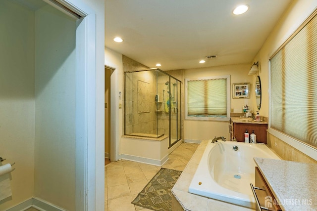 full bath featuring tile patterned flooring, visible vents, vanity, a shower stall, and a bath