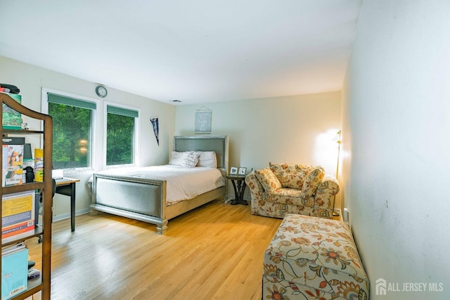 bedroom with light wood-style flooring