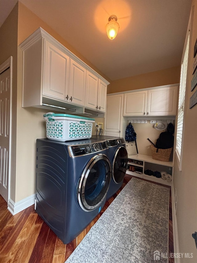 29 Mitchell Dr, Monroe, NJ 08831 - washroom featuring cabinet space, washing machine and dryer, and wood finished floors