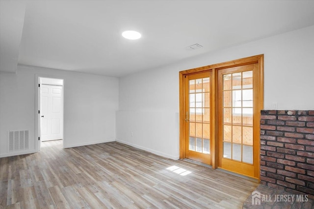 empty room featuring light hardwood / wood-style floors