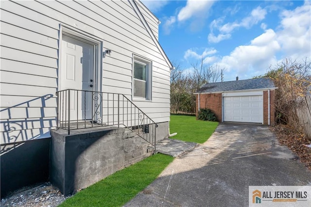8 1st St, Sayreville, NJ 08872 - view of side of property featuring asphalt driveway, an outdoor structure, a garage, and a yard