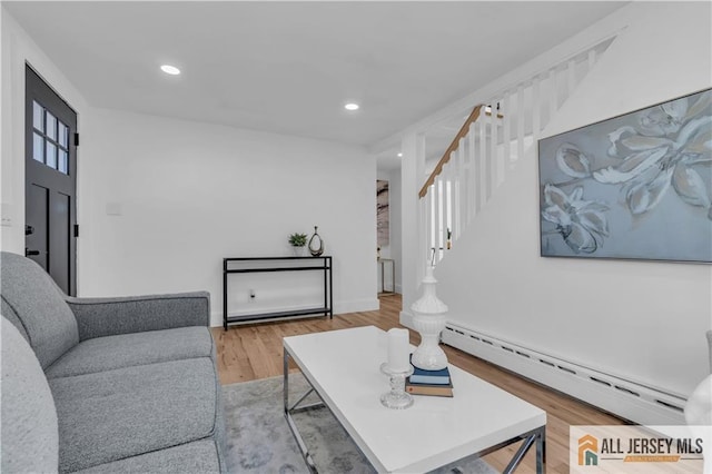 8 1st St, Sayreville, NJ 08872 - living area featuring stairway, recessed lighting, wood finished floors, and baseboard heating
