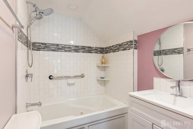 full bath with toilet, shower / bath combination, vanity, and vaulted ceiling