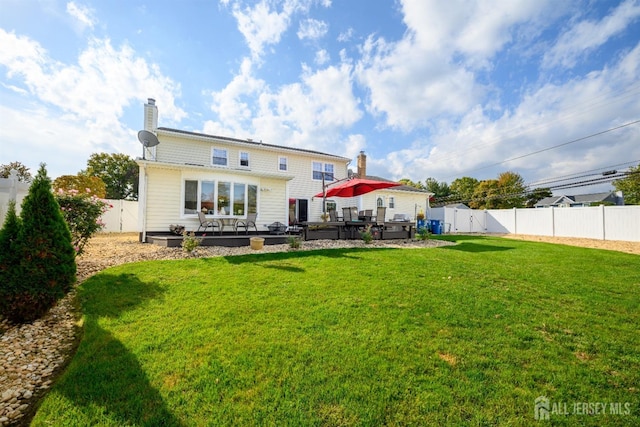 3 Romero Ct, Monroe, NJ 08831 - rear view of property with a chimney and a patio area