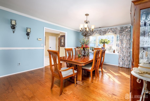 3 Romero Ct, Monroe, NJ 08831 - dining space with a chandelier, light wood-style flooring, ornamental molding, and baseboards