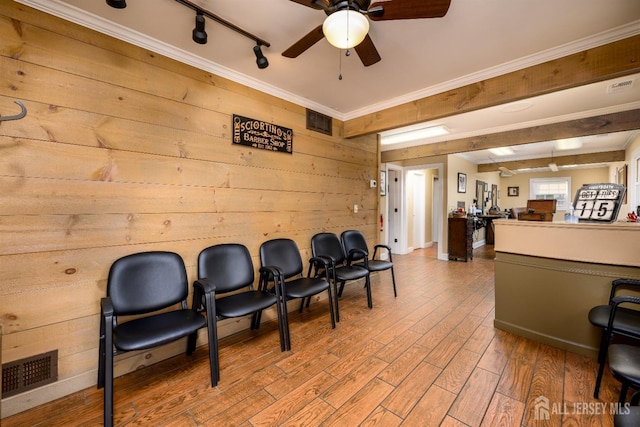 3 Romero Ct, Monroe, NJ 08831 - miscellaneous room with wood finished floors, wood walls, ceiling fan, crown molding, and rail lighting
