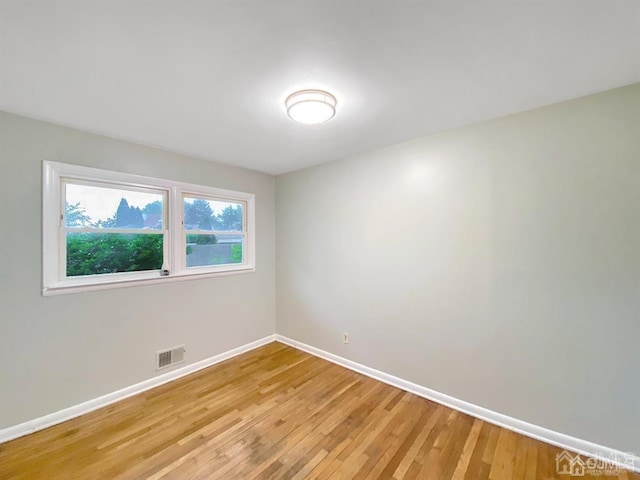 15 Race Track Rd, East Brunswick, NJ 08816 - empty room featuring baseboards and light wood-style flooring