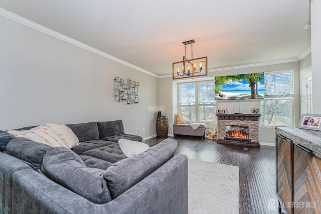 606 Bayside Ct, South Amboy, NJ 08879 - living room featuring baseboards, ornamental molding, dark wood-type flooring, a chandelier, and a fireplace