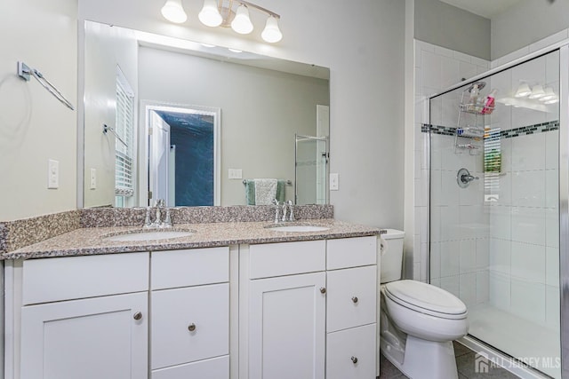 606 Bayside Ct, South Amboy, NJ 08879 - bathroom with toilet, double vanity, and a shower stall