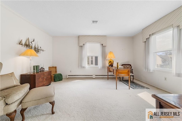 sitting room featuring a wealth of natural light, visible vents, a textured ceiling, and carpet flooring