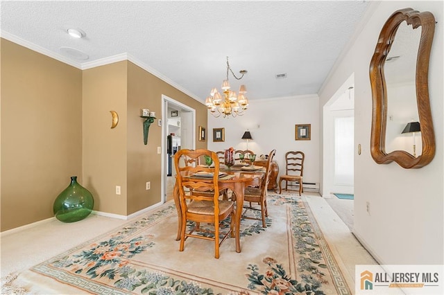 dining space with an inviting chandelier, ornamental molding, light colored carpet, and a textured ceiling