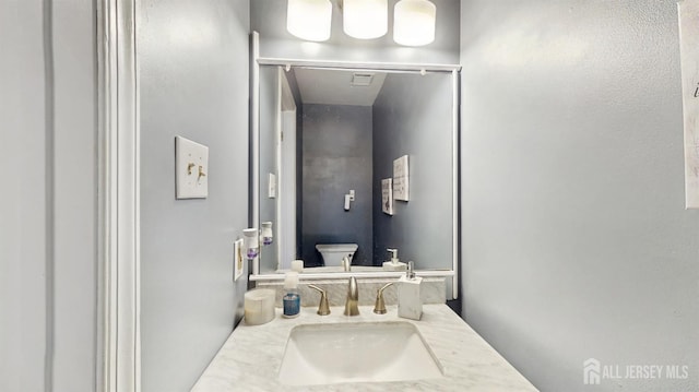 bathroom with a sink and toilet