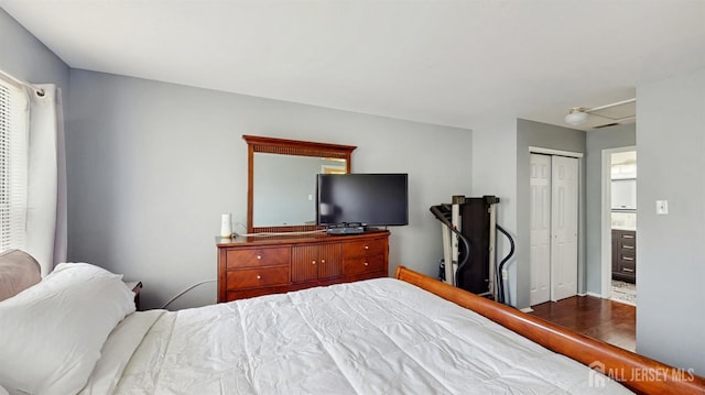 28 Clay St, North Brunswick, NJ 08902 - bedroom featuring a closet and wood finished floors