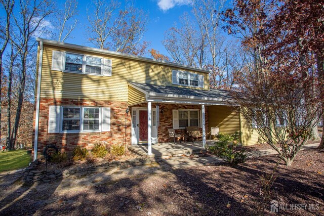 view of front of house with covered porch