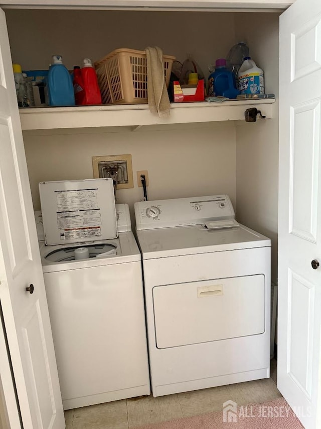 362 Minstrel Ct Unit 362, Old Bridge, NJ 08857 - washroom featuring washer and dryer and light tile patterned flooring