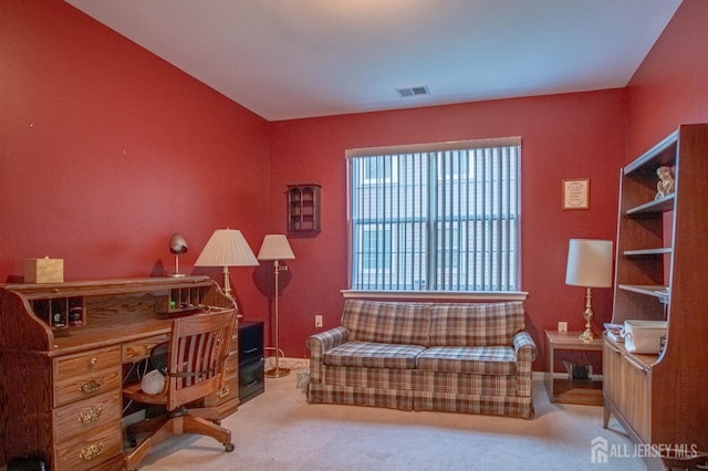carpeted office with baseboards