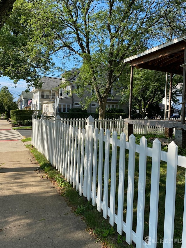 exterior space with a fenced front yard