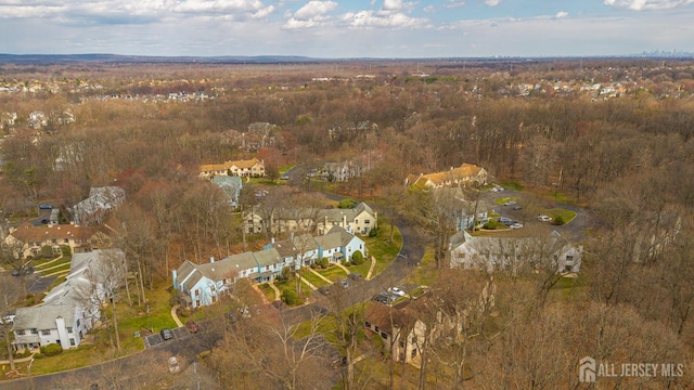 bird's eye view with a view of trees and a residential view