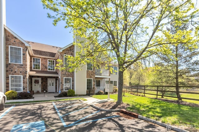 1 Lackland Ave, Piscataway, NJ 08854 - view of front facade with stone siding and a chimney
